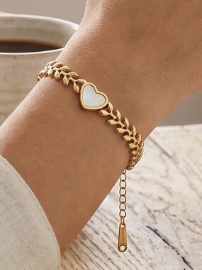 Gold Heart-Link Bracelet with White Enamel Center